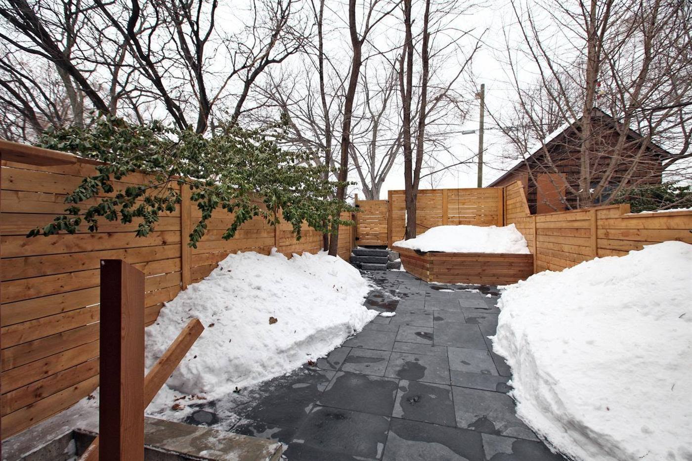 Slate patio with cedar fencing